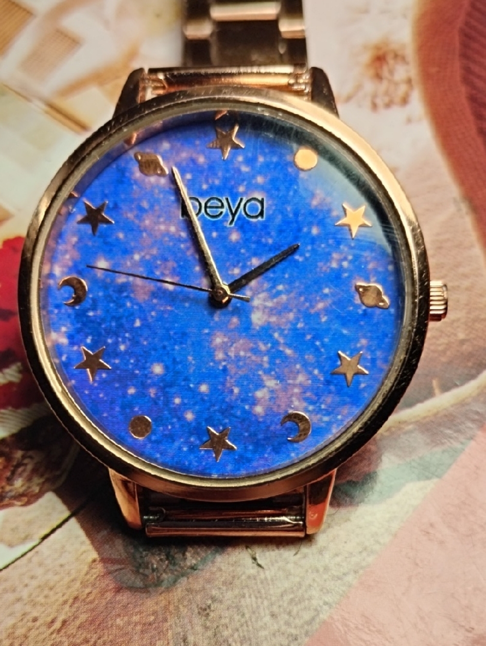 Women's Rose Gold Watch with Blue Star & Moon Dial